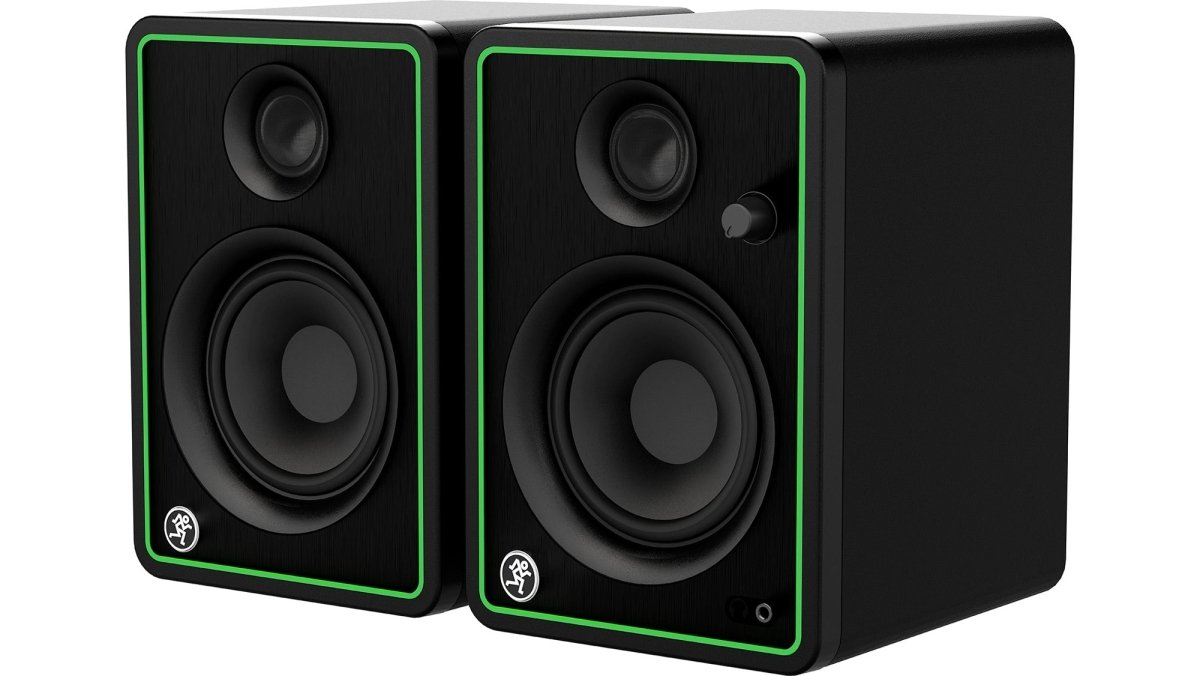 Front view of the powered Mackie CR4-XBT, highlighting the illuminated volume knob and front-panel headphone jack.