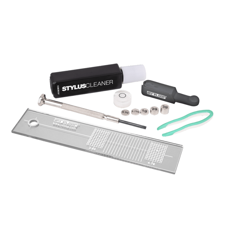 A professional Reloop toolset for turntable maintenance, including a stylus gauge, alignment tool, and cleaning supplies.